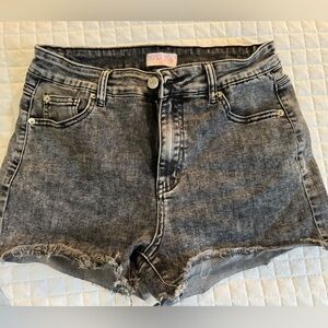 Distressed black jean shorts. New condition. Very comfortable!